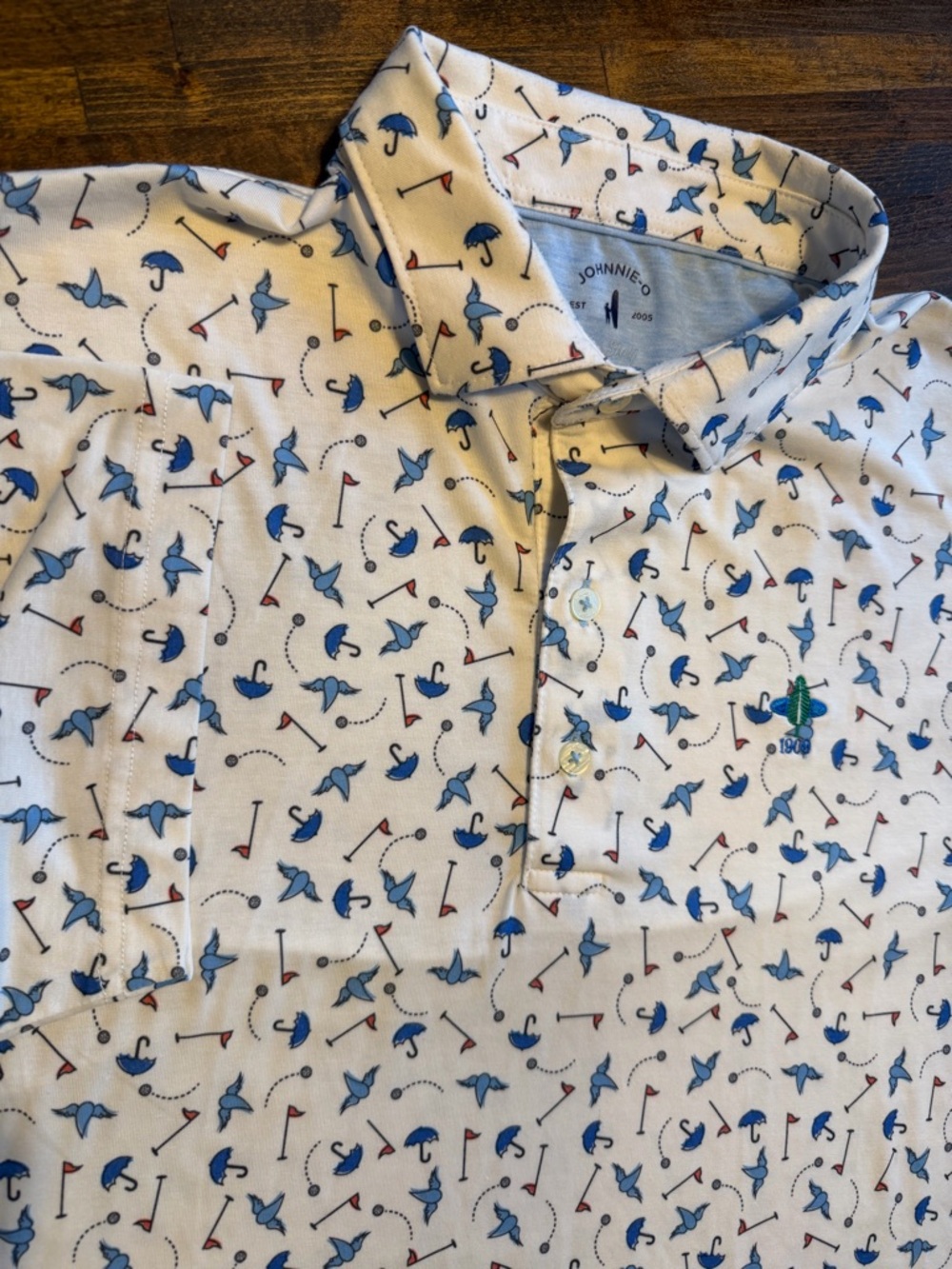 Johnnie O Top Shelf Polo Shirt Golf Mens Large Blue Raining Birdie AOP Stretch